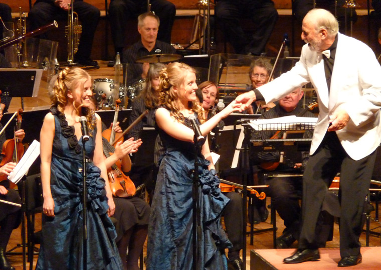 Gary Daverne congratulating Angelina & Gabriella Witten-Hannah